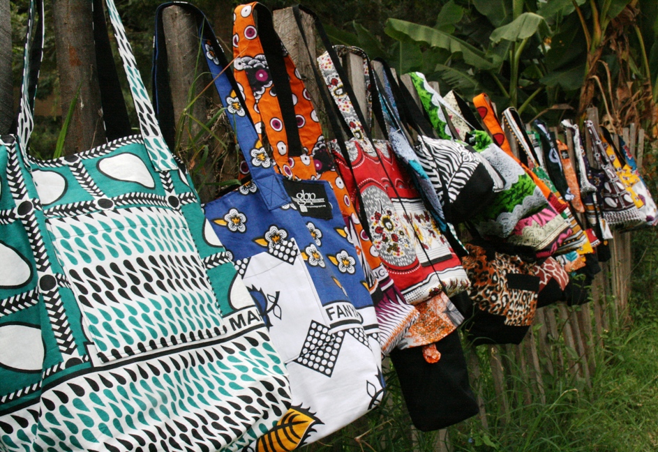 GBP kanga-cloth bags on a Kenyan fence